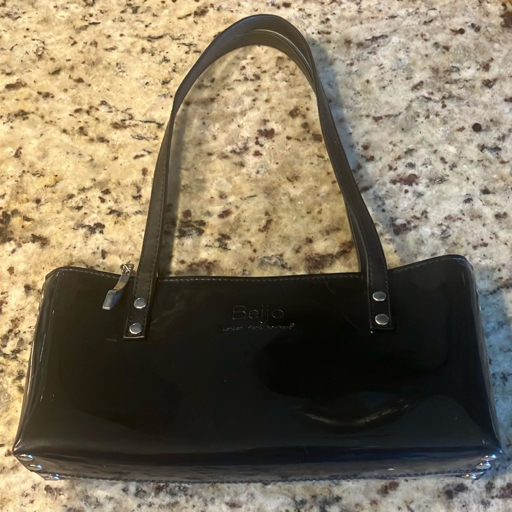Beijo Black Patent Mini  Bag with Structured Design and Metal Hardware.